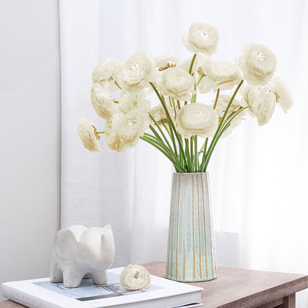 Batch of 10 Ranunculus stems available in Pink, White, and Yellow.