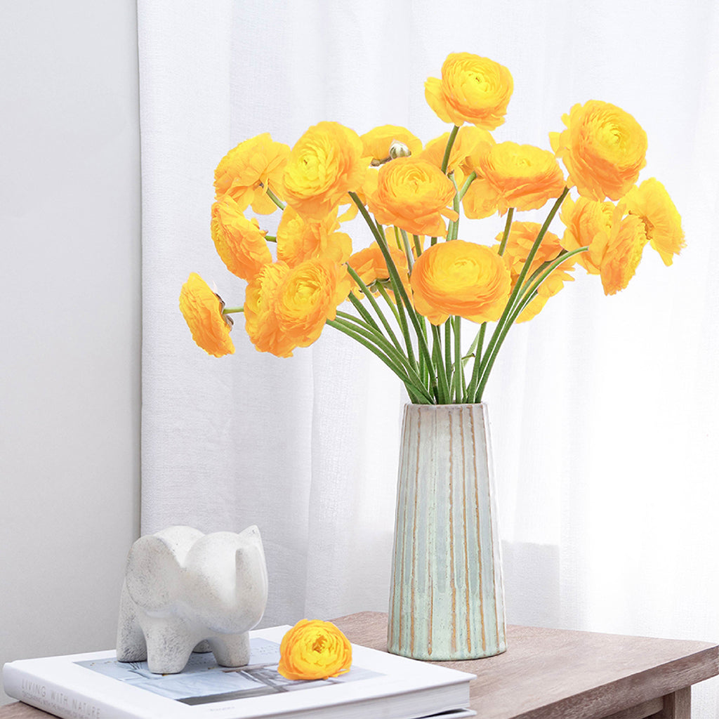 Batch of 10 Ranunculus stems available in Pink, White, and Yellow.