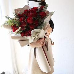 Bouquet of Premium Red Freedom Roses with Eucalyptus greeneries.